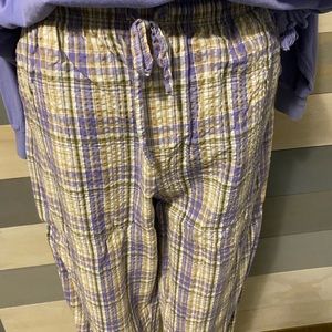 Seersucker Capri pants by Erika. Purple gold and white plaid . size large .